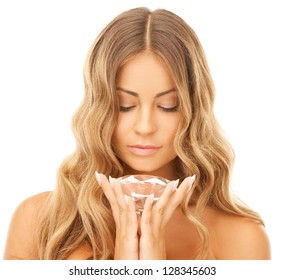 face and hands of beautiful woman with diamond