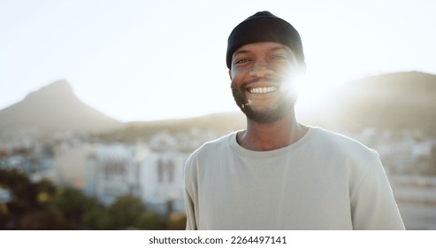 Face, happy and street style with a black man outdoor in the city with nature in the background during summer. Portrait, fashion and urban with a handsome young male standing outside in a bright town - Shutterstock ID 2264497141