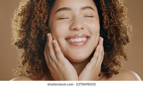 Face of happy woman, natural or healthy skin for wellness in studio with smile, facial results or glow. Dermatology, relax or confident biracial girl model with skincare cosmetics on brown background - Shutterstock ID 2370698103