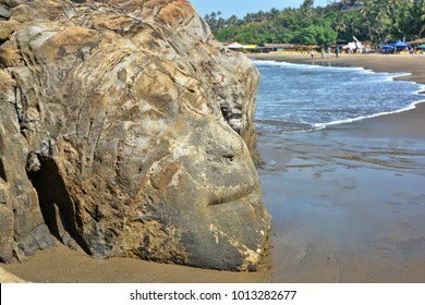 The Face Of The Hindu God Shiva Carved In Natural Stone At The Anjuna Beach In North Goa.India