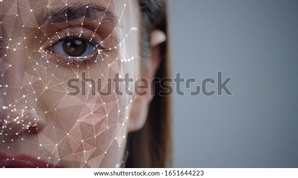 Face ID. Future. Half Face of Young Caucasian\
Woman for Face Detection. Brown Female Eye Biometrical Iris Scan\
Reading for Person Identification. Augmented Reality. 3D Technology\
Concept.