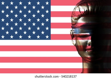 Face Of Lady Justice On U.S.A. Flag Background