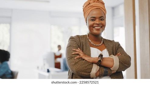 Face, leadership and black woman with arms crossed in office ready for targets or goals. Boss, ceo and happy female entrepreneur from South Africa with vision, mission or success mindset in workplace - Shutterstock ID 2258572521