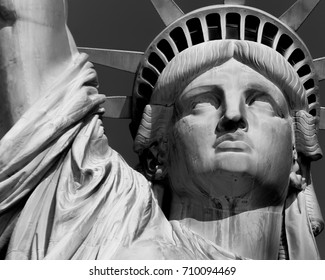 statue of liberty face close up black and white