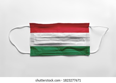 Face Mask With Hungary Flag Printed, On White Background, Isolated.