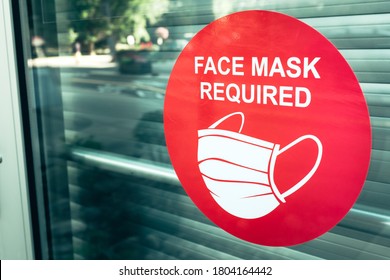 Face Mask Required Sign Outside Glass Window