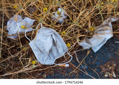 Face Mask And Rubbish On The Ground