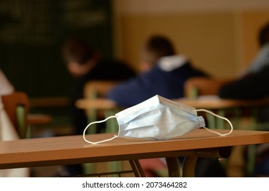 face mask in school, surgical drape, bench in the classroom, obligation to wear a face mask in the school, pupils in class, children - Shutterstock ID 2073464282