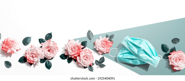 Face Masks With Pink Roses Overhead View - Flat Lay