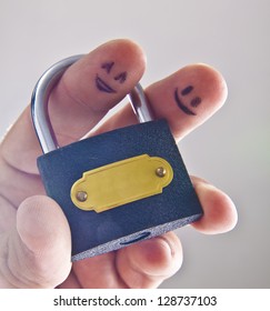 Face Painted On His Fingers With A Lock - Symbol Of Slavery And Unequal Relationship Of Subordination