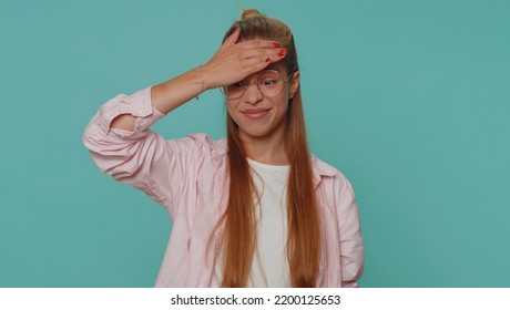 Face Palm. Shame On You. Upset Pretty Teenager Girl Making Face Palm Gesture, Feeling Bored, Disappointed In Result, Bad News. Young Female Child Kid Isolated Alone On Blue Studio Background Indoors