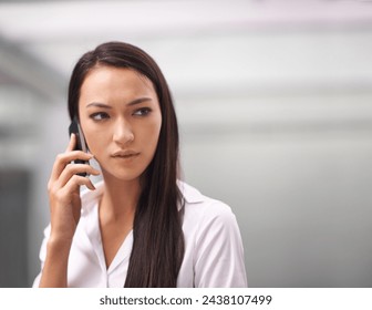 Face, phone call and serious with business woman in corporate office for communication or networking. Concern, problem solving and thinking with worried young employee talking on mobile in workplace - Powered by Shutterstock