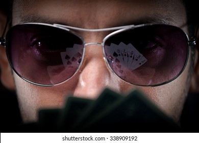 Face of Poker Player in a Sunglasses Close-Up