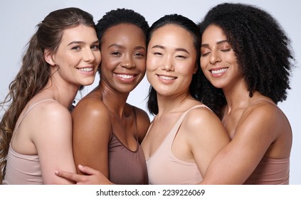 Face portrait, beauty and group of women in studio on gray background. Cosmetics, makeup and diversity of female models with glowing and flawless skin after spa facial treatment posing for skincare. - Shutterstock ID 2239226069