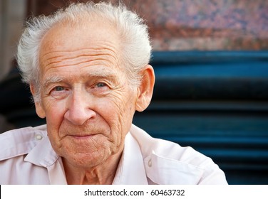 face portrait of a cheerful smiling senior man - Powered by Shutterstock