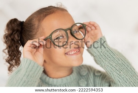 Face portrait, child and girl with glasses for optical health at optometrist office. Eyes wellness, eye care and happy kid with specs, spectacles or prescription lenses to help with ocular vision. Stok fotoğraf © 