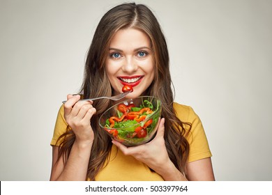 Face Portrait Of Young Happy Woman Eating Salad. Healthy Lifestyle With Green Food.