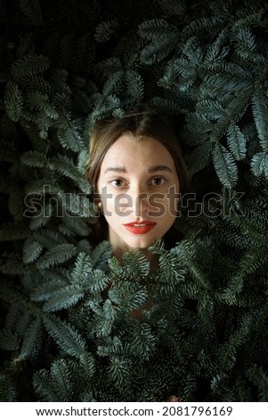 Similar – Teenage woman surrounded by confetti