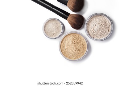 Face powder and brush isolated on white