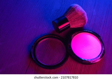 Face Powder And Brush On The Table Close Up.