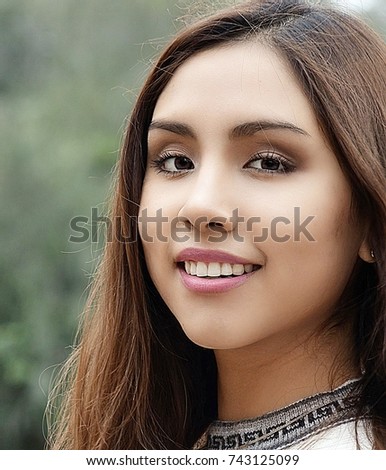 Face Of Pretty Smiling Young Woman
