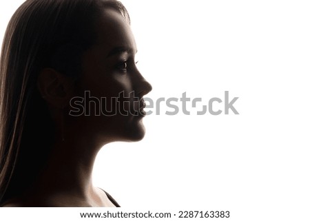 Face profile. Woman silhouette. Beauty enhancement. Aesthetic cosmetology. Closeup female portrait on white empty space background.