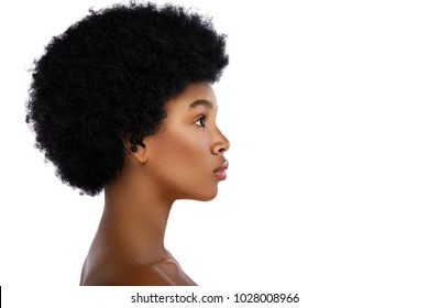Face profile of young and cute african woman on white background