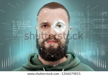 Face recognition and human recognition. The concept of computer vision and artificial intelligence. A man with a beard