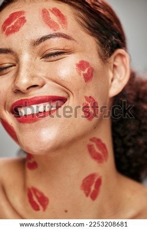 Face, red lipstick kiss and makeup on face model woman in studio for cosmetics and happiness. Headshot of aesthetic person happy about love for valentines day spa facial or skincare motivation