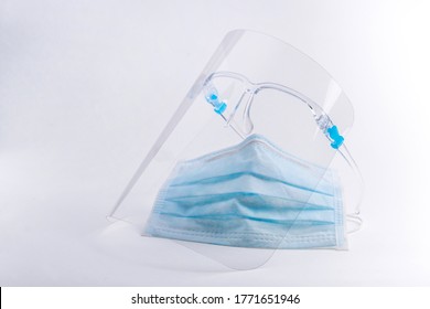 Face Shield And Mask Isolated On A White Background.