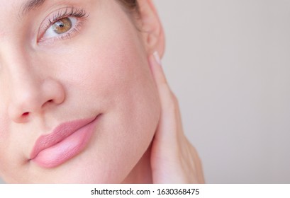 
face skin of a beautiful girl with pores closeup