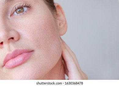 
face skin of a beautiful girl with pores closeup