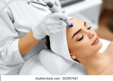 Face Skin Care. Close-up Of Woman Getting Facial Hydro Microdermabrasion Peeling Treatment At Cosmetic Beauty Spa Clinic. Hydra Vacuum Cleaner. Exfoliation, Rejuvenation And Hydratation. Cosmetology.  - Shutterstock ID 352907567
