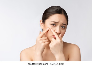 Face Skin Problem - Young Woman Unhappy Touch Her Skin Isolated, Concept For Skin Care, Asian.