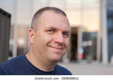 Face Of Smiling Mature European Man Of Large Build.