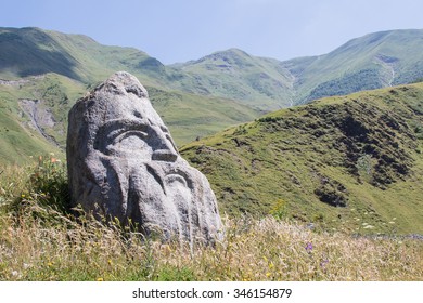 The Face Of A Stone Head