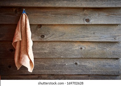 Face Towel Hanging On A Wooden Wall