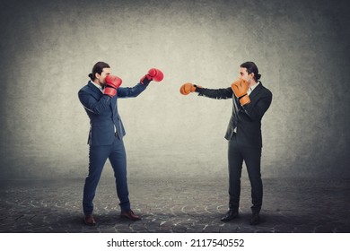 Face You Own Fears Business Metaphor As A Businessman With Boxing Gloves Confronts His Office Clone Or Copy. Fighting Yourself, Self Overcome And Leadership Concept