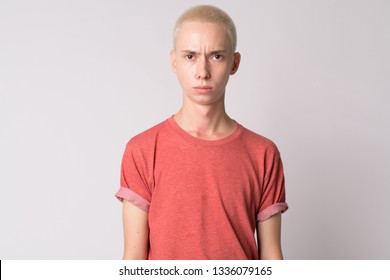 Face of young serious androgynous man looking at camera - Powered by Shutterstock