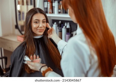 Face Of Young Woman Getting Blush Powder On Her Cheek With A Brush. Beauty Salon Services