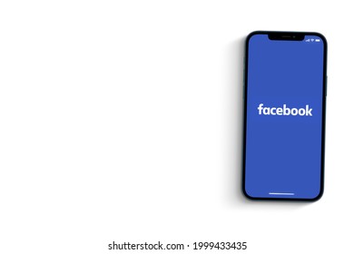 Facebook App On Smartphone Screen On White Background. Social Media From The Same Group As Instagram And Whatsapp. Top View. Rio De Janeiro, RJ, Brazil. June 2021.