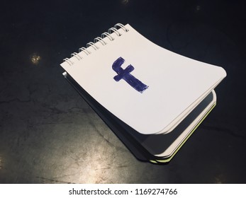 Facebook Logo On A Note Pad