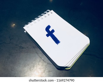 Facebook Logo On A Note Pad