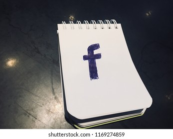 Facebook Logo On A Note Pad