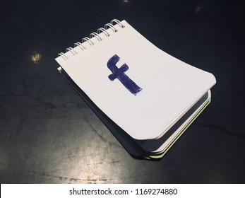 Facebook Logo On A Note Pad