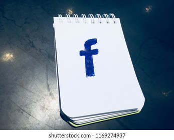 Facebook Logo On A Note Pad