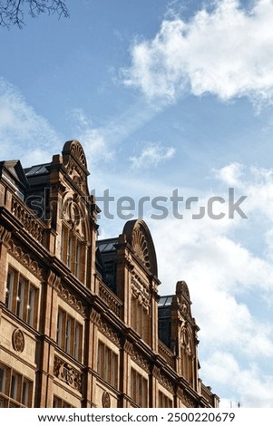 A facede of old fashioned building in the Central London