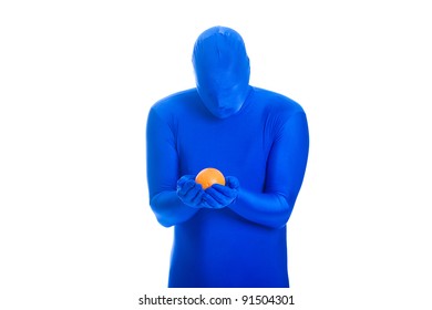 Faceless Man In A Blue Body Suit Holding A Fresh Orange.