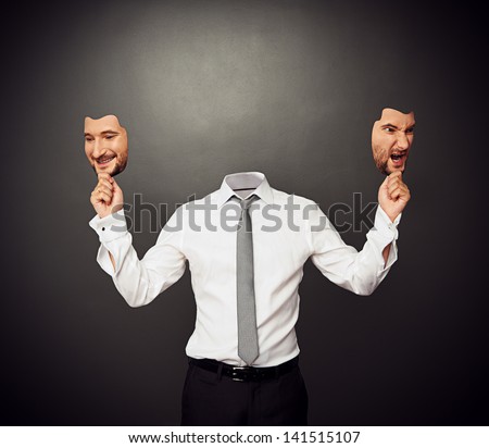 faceless man holding masks with good and bad moods