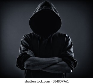 scary man in black hoodie